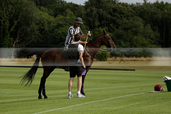 Jaeger Le Coultre (black)  v Wairakei Pastoral (white) in a Jaeger Le Coultre Holden White Cup polo match played on 29 July 2013 at Cowdray Park Polo Club on Brooksfieldwww.polopictures.co.uk