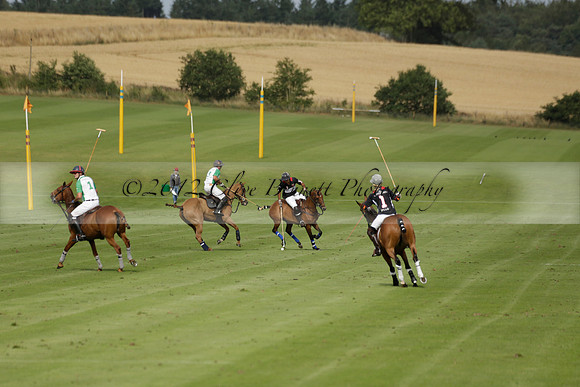 Jaeger Le Coultre (black)  v Wairakei Pastoral (white) in a Jaeger Le Coultre Holden White Cup polo match played on 29 July 2013 at Cowdray Park Polo Club on Brooksfieldwww.polopictures.co.uk