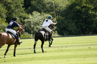 Pandas (white) v Home Farm (navy) in a Park House West Sussex Cup Polo match on Brooksfield at Cowdray Park Polo Club on Friday 30 August 2013. 2013.08.30 www.polopictures.co.uk