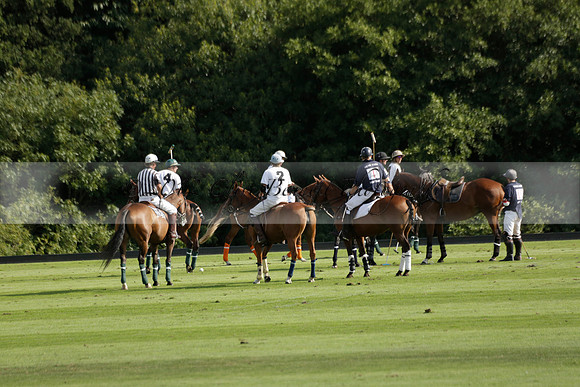 Pandas (white) v Home Farm (navy) in a Park House West Sussex Cup Polo match on Brooksfield at Cowdray Park Polo Club on Friday 30 August 2013. 2013.08.30 www.polopictures.co.uk