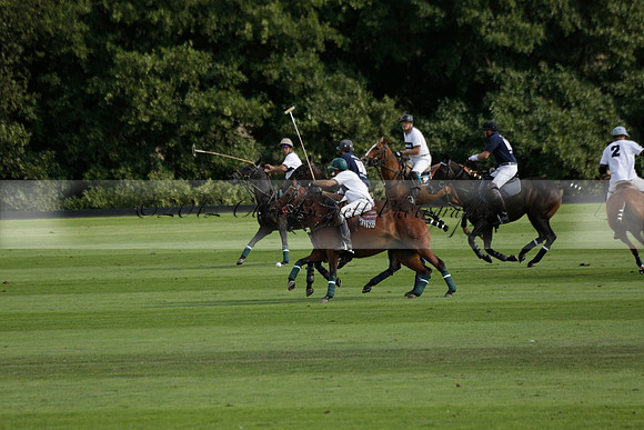 Pandas (white) v Home Farm (navy) in a Park House West Sussex Cup Polo match on Brooksfield at Cowdray Park Polo Club on Friday 30 August 2013. 2013.08.30 www.polopictures.co.uk