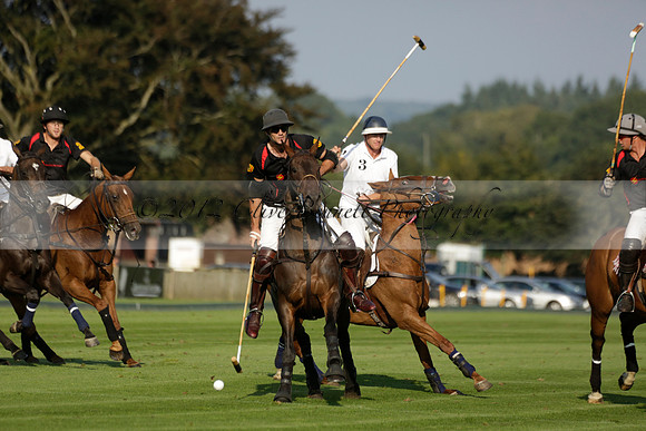 Pluma Negra (white) v Shoreline (black) in the Brecknock Cup Subsidiary final polo match played on Sunday 25 August 2013 at Cowdray Park Polo Club on Ambersham 1. 2013.10.12 www.polopictures.co.uk