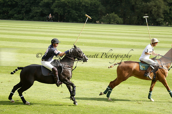 Pandas (white) v Home Farm (navy) in a Park House West Sussex Cup Polo match on Brooksfield at Cowdray Park Polo Club on Friday 30 August 2013. 2013.08.30 www.polopictures.co.uk