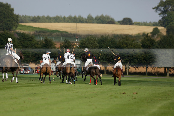 Pluma Negra (white) v Shoreline (black) in the Brecknock Cup Subsidiary final polo match played on Sunday 25 August 2013 at Cowdray Park Polo Club on Ambersham 1. 2013.10.12 www.polopictures.co.uk