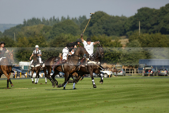 Pluma Negra (white) v Shoreline (black) in the Brecknock Cup Subsidiary final polo match played on Sunday 25 August 2013 at Cowdray Park Polo Club on Ambersham 1. 2013.10.12 www.polopictures.co.uk