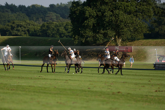Pluma Negra (white) v Shoreline (black) in the Brecknock Cup Subsidiary final polo match played on Sunday 25 August 2013 at Cowdray Park Polo Club on Ambersham 1. 2013.10.12 www.polopictures.co.uk