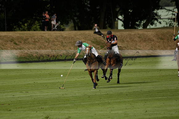 Jaeger Le Coultre (black)  v Wairakei Pastoral (white) in a Jaeger Le Coultre Holden White Cup polo match played on 29 July 2013 at Cowdray Park Polo Club on Brooksfieldwww.polopictures.co.uk