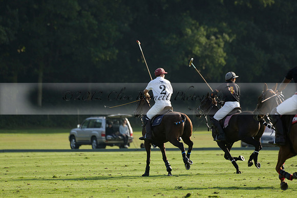 Pluma Negra (white) v Shoreline (black) in the Brecknock Cup Subsidiary final polo match played on Sunday 25 August 2013 at Cowdray Park Polo Club on Ambersham 1. 2013.10.12 www.polopictures.co.uk