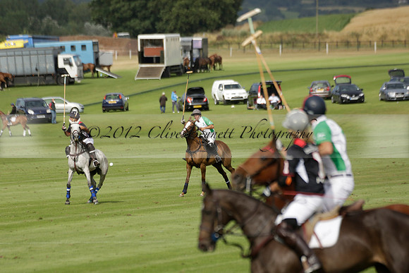 Jaeger Le Coultre (black)  v Wairakei Pastoral (white) in a Jaeger Le Coultre Holden White Cup polo match played on 29 July 2013 at Cowdray Park Polo Club on Brooksfieldwww.polopictures.co.uk