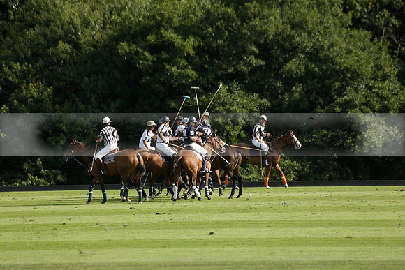 Pandas (white) v Home Farm (navy) in a Park House West Sussex Cup Polo match on Brooksfield at Cowdray Park Polo Club on Friday 30 August 2013. 2013.08.30 www.polopictures.co.uk