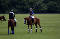 Ghost Chilli (blue) v Somerton (pale blue) in a Lodsworth 4 Goal polo match played on Sunday 25 August 2013 at Cowdray Park Polo Club on Brooksfield. 2013.10.12 www.polopictures.co.uk