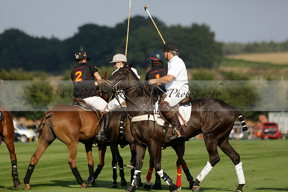 Pluma Negra (white) v Shoreline (black) in the Brecknock Cup Subsidiary final polo match played on Sunday 25 August 2013 at Cowdray Park Polo Club on Ambersham 1. 2013.10.12 www.polopictures.co.uk