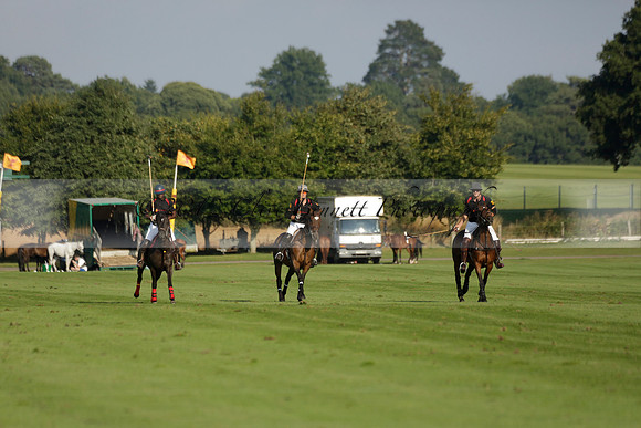 Pluma Negra (white) v Shoreline (black) in the Brecknock Cup Subsidiary final polo match played on Sunday 25 August 2013 at Cowdray Park Polo Club on Ambersham 1. 2013.10.12 www.polopictures.co.uk