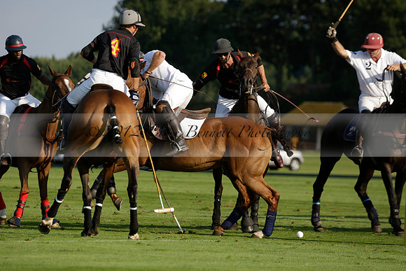 Pluma Negra (white) v Shoreline (black) in the Brecknock Cup Subsidiary final polo match played on Sunday 25 August 2013 at Cowdray Park Polo Club on Ambersham 1. 2013.10.12 www.polopictures.co.uk
