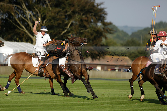 Pluma Negra (white) v Shoreline (black) in the Brecknock Cup Subsidiary final polo match played on Sunday 25 August 2013 at Cowdray Park Polo Club on Ambersham 1. 2013.10.12 www.polopictures.co.uk