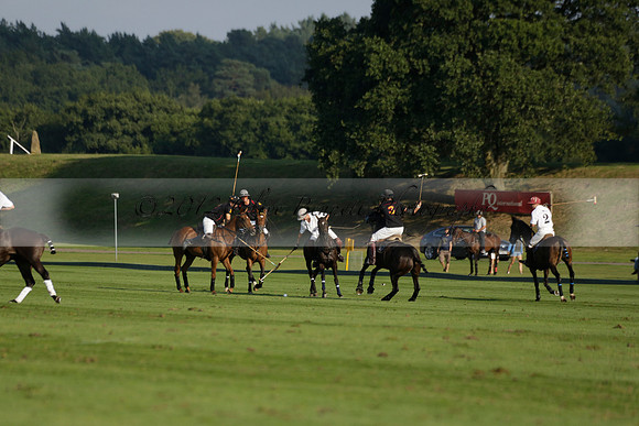 Pluma Negra (white) v Shoreline (black) in the Brecknock Cup Subsidiary final polo match played on Sunday 25 August 2013 at Cowdray Park Polo Club on Ambersham 1. 2013.10.12 www.polopictures.co.uk