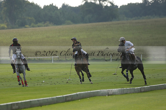 Pluma Negra (white) v Shoreline (black) in the Brecknock Cup Subsidiary final polo match played on Sunday 25 August 2013 at Cowdray Park Polo Club on Ambersham 1. 2013.10.12 www.polopictures.co.uk