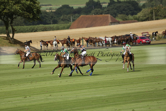 Jaeger Le Coultre (black)  v Wairakei Pastoral (white) in a Jaeger Le Coultre Holden White Cup polo match played on 29 July 2013 at Cowdray Park Polo Club on Brooksfieldwww.polopictures.co.uk