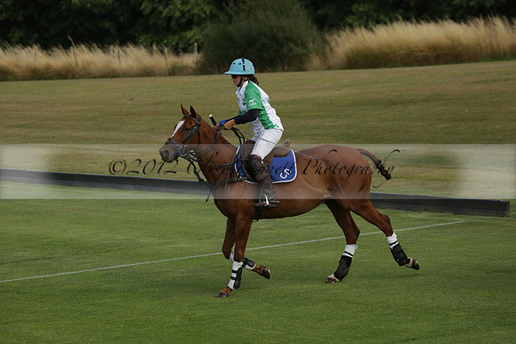 Jaeger Le Coultre (black)  v Wairakei Pastoral (white) in a Jaeger Le Coultre Holden White Cup polo match played on 29 July 2013 at Cowdray Park Polo Club on Brooksfieldwww.polopictures.co.uk