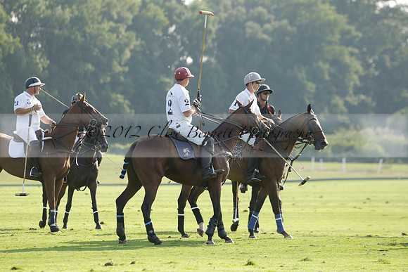 Pluma Negra (white) v Shoreline (black) in the Brecknock Cup Subsidiary final polo match played on Sunday 25 August 2013 at Cowdray Park Polo Club on Ambersham 1. 2013.10.12 www.polopictures.co.uk