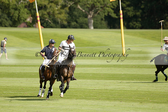 Pandas (white) v Home Farm (navy) in a Park House West Sussex Cup Polo match on Brooksfield at Cowdray Park Polo Club on Friday 30 August 2013. 2013.08.30 www.polopictures.co.uk