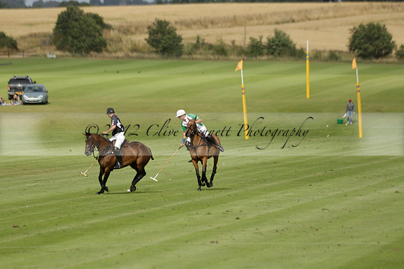Jaeger Le Coultre (black)  v Wairakei Pastoral (white) in a Jaeger Le Coultre Holden White Cup polo match played on 29 July 2013 at Cowdray Park Polo Club on Brooksfieldwww.polopictures.co.uk