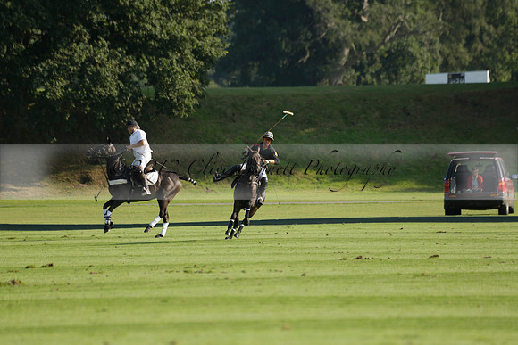 Pluma Negra (white) v Shoreline (black) in the Brecknock Cup Subsidiary final polo match played on Sunday 25 August 2013 at Cowdray Park Polo Club on Ambersham 1. 2013.10.12 www.polopictures.co.uk