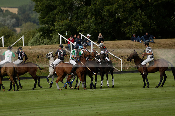 Jaeger Le Coultre (black)  v Wairakei Pastoral (white) in a Jaeger Le Coultre Holden White Cup polo match played on 29 July 2013 at Cowdray Park Polo Club on Brooksfieldwww.polopictures.co.uk