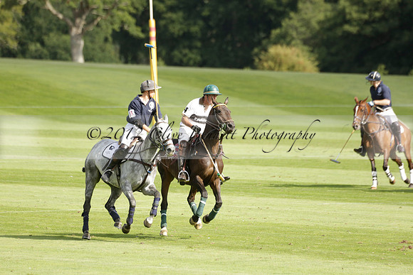 Pandas (white) v Home Farm (navy) in a Park House West Sussex Cup Polo match on Brooksfield at Cowdray Park Polo Club on Friday 30 August 2013. 2013.08.30 www.polopictures.co.uk