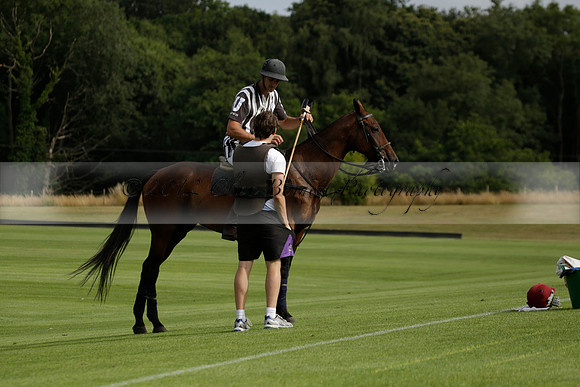 Jaeger Le Coultre (black)  v Wairakei Pastoral (white) in a Jaeger Le Coultre Holden White Cup polo match played on 29 July 2013 at Cowdray Park Polo Club on Brooksfieldwww.polopictures.co.uk