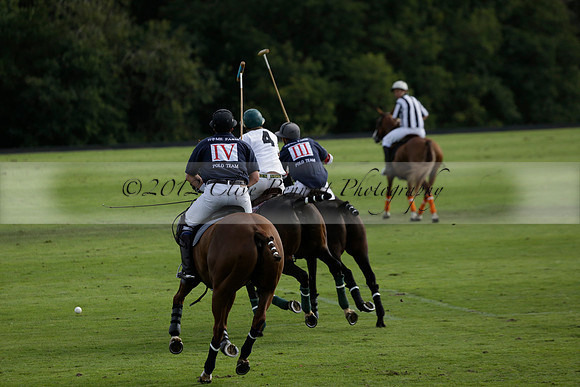 Pandas (white) v Home Farm (navy) in a Park House West Sussex Cup Polo match on Brooksfield at Cowdray Park Polo Club on Friday 30 August 2013. 2013.08.30 www.polopictures.co.uk
