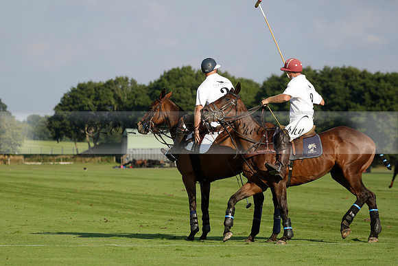 Pluma Negra (white) v Shoreline (black) in the Brecknock Cup Subsidiary final polo match played on Sunday 25 August 2013 at Cowdray Park Polo Club on Ambersham 1. 2013.10.12 www.polopictures.co.uk