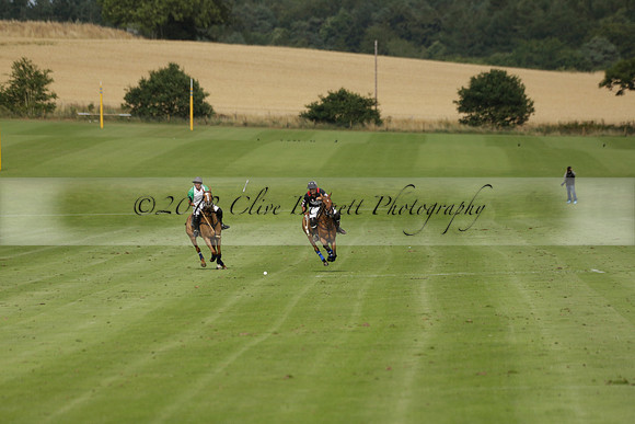 Jaeger Le Coultre (black)  v Wairakei Pastoral (white) in a Jaeger Le Coultre Holden White Cup polo match played on 29 July 2013 at Cowdray Park Polo Club on Brooksfieldwww.polopictures.co.uk