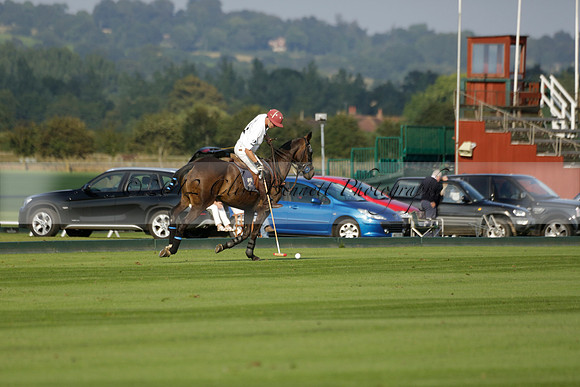 Pluma Negra (white) v Shoreline (black) in the Brecknock Cup Subsidiary final polo match played on Sunday 25 August 2013 at Cowdray Park Polo Club on Ambersham 1. 2013.10.12 www.polopictures.co.uk