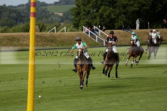 Jaeger Le Coultre (black)  v Wairakei Pastoral (white) in a Jaeger Le Coultre Holden White Cup polo match played on 29 July 2013 at Cowdray Park Polo Club on Brooksfieldwww.polopictures.co.uk