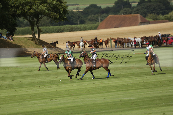 Jaeger Le Coultre (black)  v Wairakei Pastoral (white) in a Jaeger Le Coultre Holden White Cup polo match played on 29 July 2013 at Cowdray Park Polo Club on Brooksfieldwww.polopictures.co.uk