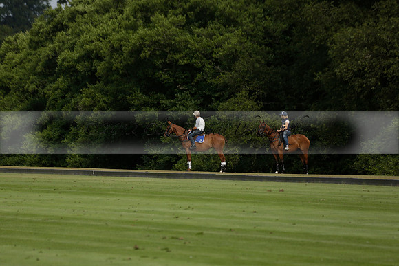 Jaeger Le Coultre (black)  v Wairakei Pastoral (white) in a Jaeger Le Coultre Holden White Cup polo match played on 29 July 2013 at Cowdray Park Polo Club on Brooksfieldwww.polopictures.co.uk
