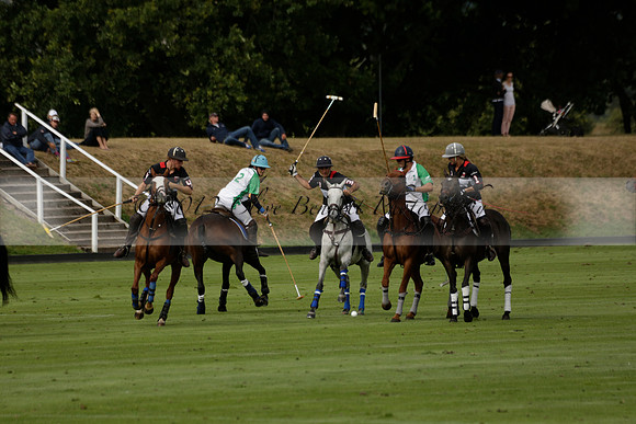 Jaeger Le Coultre (black)  v Wairakei Pastoral (white) in a Jaeger Le Coultre Holden White Cup polo match played on 29 July 2013 at Cowdray Park Polo Club on Brooksfieldwww.polopictures.co.uk