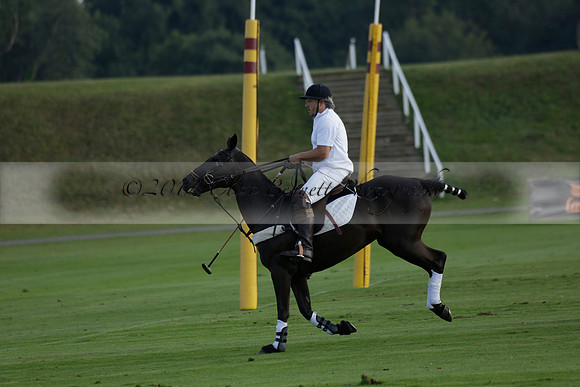 Pluma Negra (white) v Shoreline (black) in the Brecknock Cup Subsidiary final polo match played on Sunday 25 August 2013 at Cowdray Park Polo Club on Ambersham 1. 2013.10.12 www.polopictures.co.uk
