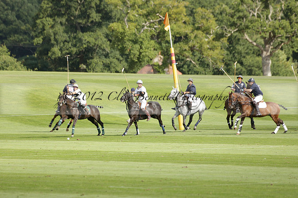 Pandas (white) v Home Farm (navy) in a Park House West Sussex Cup Polo match on Brooksfield at Cowdray Park Polo Club on Friday 30 August 2013. 2013.08.30 www.polopictures.co.uk