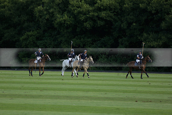 Pandas (white) v Home Farm (navy) in a Park House West Sussex Cup Polo match on Brooksfield at Cowdray Park Polo Club on Friday 30 August 2013. 2013.08.30 www.polopictures.co.uk