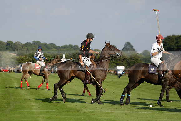 Pluma Negra (white) v Shoreline (black) in the Brecknock Cup Subsidiary final polo match played on Sunday 25 August 2013 at Cowdray Park Polo Club on Ambersham 1. 2013.10.12 www.polopictures.co.uk