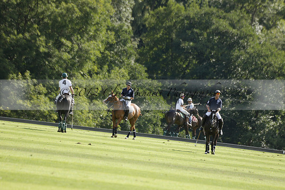 Pandas (white) v Home Farm (navy) in a Park House West Sussex Cup Polo match on Brooksfield at Cowdray Park Polo Club on Friday 30 August 2013. 2013.08.30 www.polopictures.co.uk