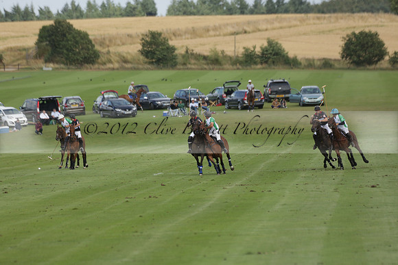 Jaeger Le Coultre (black)  v Wairakei Pastoral (white) in a Jaeger Le Coultre Holden White Cup polo match played on 29 July 2013 at Cowdray Park Polo Club on Brooksfieldwww.polopictures.co.uk
