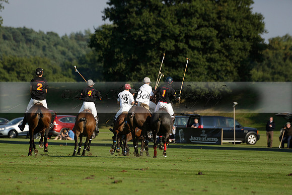 Pluma Negra (white) v Shoreline (black) in the Brecknock Cup Subsidiary final polo match played on Sunday 25 August 2013 at Cowdray Park Polo Club on Ambersham 1. 2013.10.12 www.polopictures.co.uk