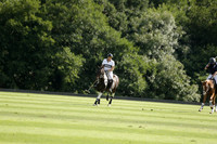 Pandas (white) v Home Farm (navy) in a Park House West Sussex Cup Polo match on Brooksfield at Cowdray Park Polo Club on Friday 30 August 2013. 2013.08.30 www.polopictures.co.uk