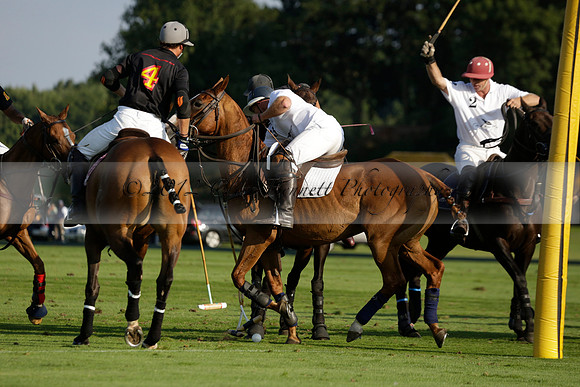 Pluma Negra (white) v Shoreline (black) in the Brecknock Cup Subsidiary final polo match played on Sunday 25 August 2013 at Cowdray Park Polo Club on Ambersham 1. 2013.10.12 www.polopictures.co.uk