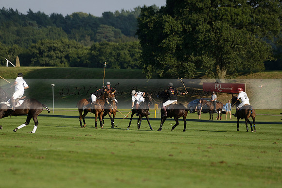 Pluma Negra (white) v Shoreline (black) in the Brecknock Cup Subsidiary final polo match played on Sunday 25 August 2013 at Cowdray Park Polo Club on Ambersham 1. 2013.10.12 www.polopictures.co.uk
