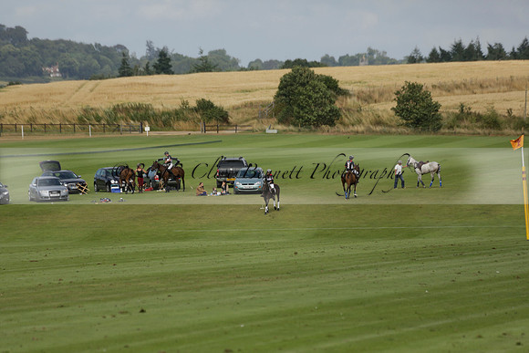 Jaeger Le Coultre (black)  v Wairakei Pastoral (white) in a Jaeger Le Coultre Holden White Cup polo match played on 29 July 2013 at Cowdray Park Polo Club on Brooksfieldwww.polopictures.co.uk