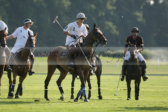 Pluma Negra (white) v Shoreline (black) in the Brecknock Cup Subsidiary final polo match played on Sunday 25 August 2013 at Cowdray Park Polo Club on Ambersham 1. 2013.10.12 www.polopictures.co.uk
